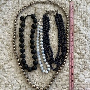 Four beaded necklaces: silver glass, etc.